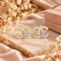 Boucles d’Oreilles Dorées Double Motif Entrelacé ✨
